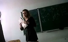 Teacher legs and upskirt in class room