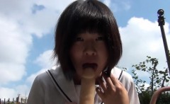 Asian teen rides dildo