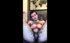 Fingering his hairy ass hole